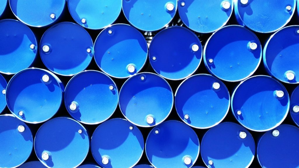 pexels-photo-615670-615670 Top view of stacked blue industrial drums forming a geometric pattern.